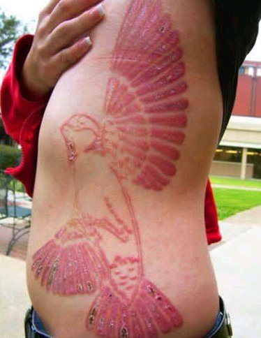 25 Insane Scarification Tattoos