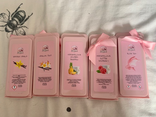 Five snap bars in baby pink packaging