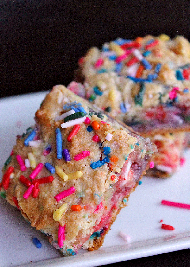 Try these simple and fun Gooey Sprinkle Bars for your next birthday, book club night, or kids in the kitchen time. Similar to blondies, these colorful bars are chewy and melt in your mouth with a generous white chocolate sprinkle layer.