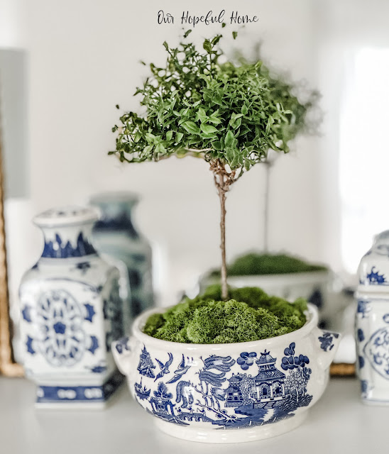 chinoiserie mantel decor preserved moss.