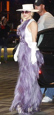 Lady Gaga Hits Hong Kong In A Gown Made Of Purple Hair