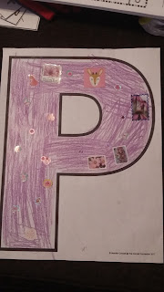 We colored the P pink and purple and then put pink and purple stickers all over the P.