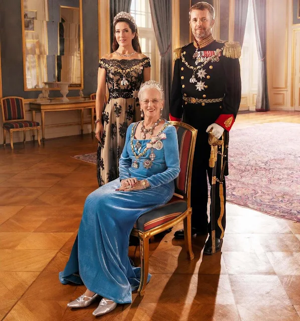 Crown Princess Mary wore a black tulle lace gown. Princess Marie wore a yellow gown. Queen Margrethe wore a sky blue maxi gown