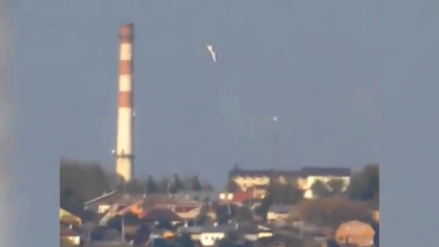 Original screenshot from the video showing two UFOs directly above the nuclear power station.