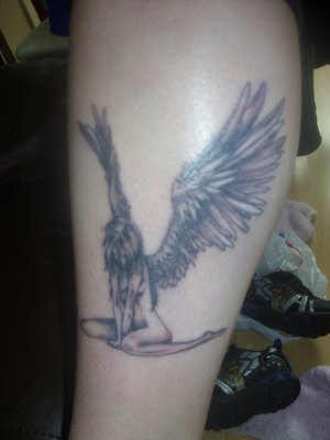 of angel tattoos , angel and cherub tattoos - let the angel express your