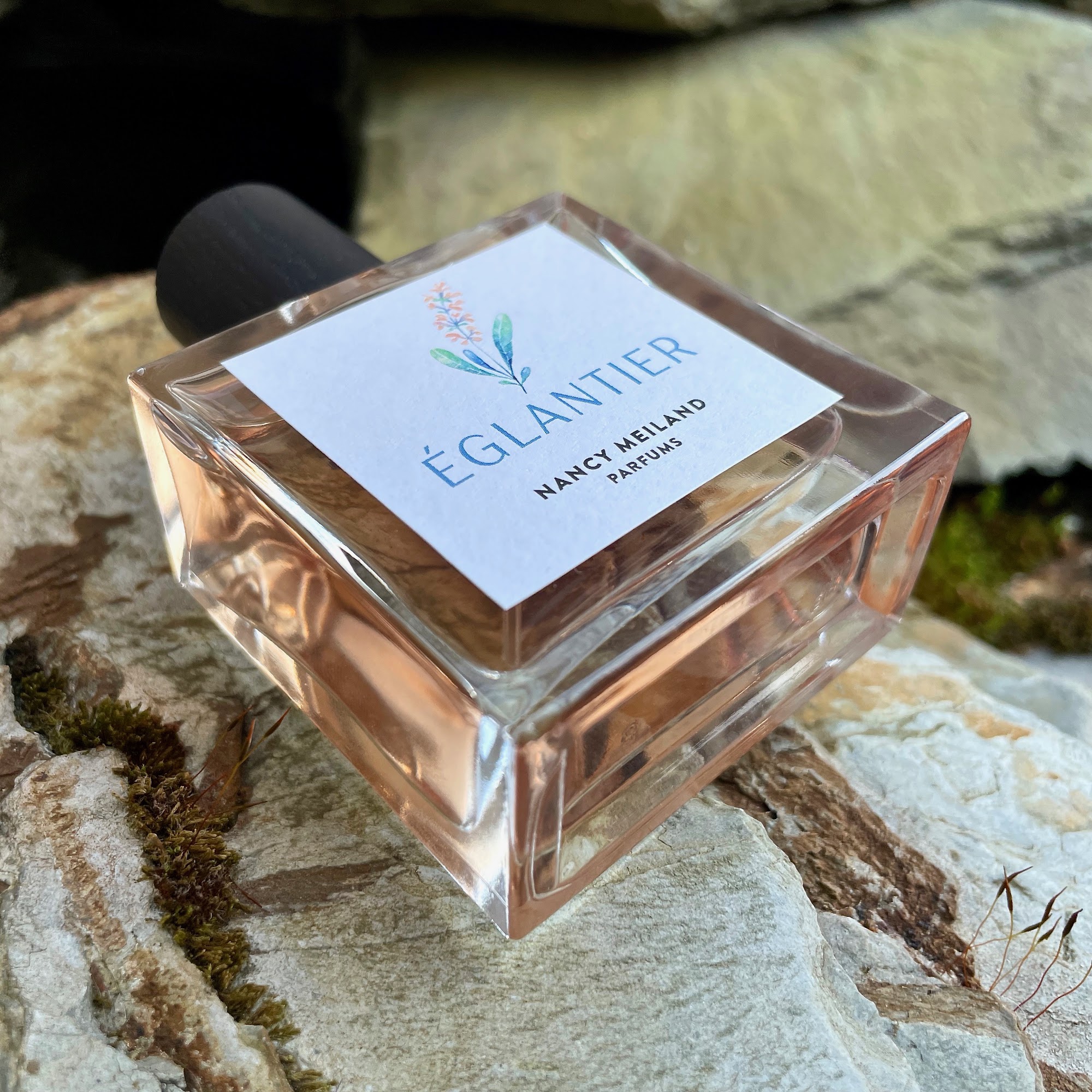 A bottle of Églantier perfume by Nancy Meiland Parfums