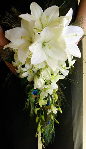 This Asiatic lily and Peacock feather bouquet is simply stunning