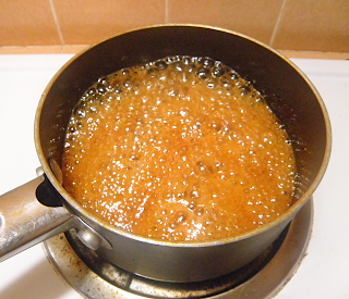 Apple Syrup in Saucepan with Big Bubbles