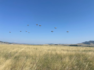 Rangers parachuting into the Mann Gulch area