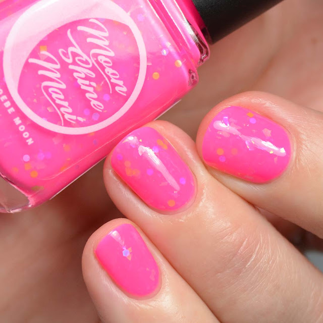 neon pink nail polish with glitter