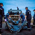 PHOTOS: Bodies of MH17 crash victims tossed into rubbish trucks and taken to morgue train after 3 days laying in field