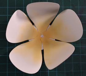 5 hot air balloon shapes glued to circular base to create base flower