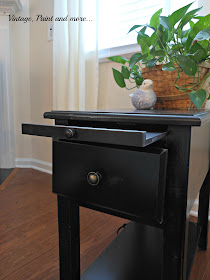 an added tabletop extension for a small side table