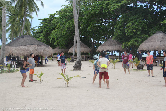 Playing Frisbee in beach - Cowrie Island