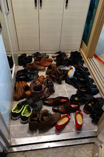 Shoes in Korean doorway after wedding