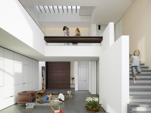 Photo of interiors in an amazing home showing stairs and kids playing