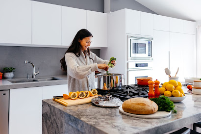 A woman cooking a healthy meal