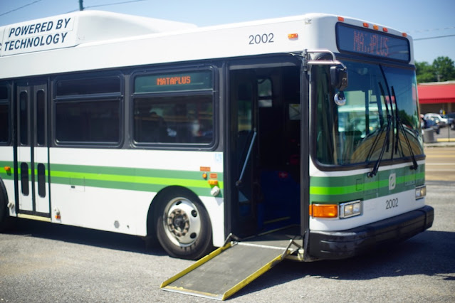 A MATA bus with ramp deployed.