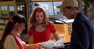 Dina Platias with her co-actors while school bus in the background