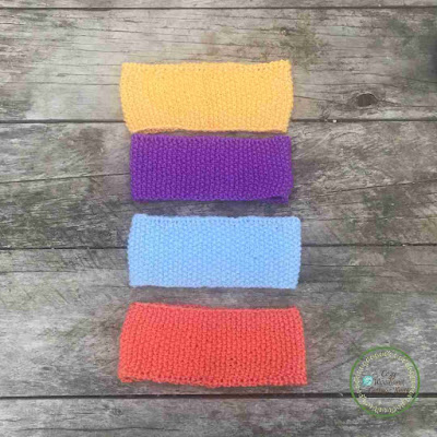Picture of a group of four  knitted toddler headbands