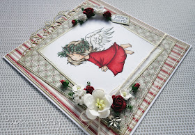 Christmas angel in traditional red and green (image from LOTV)