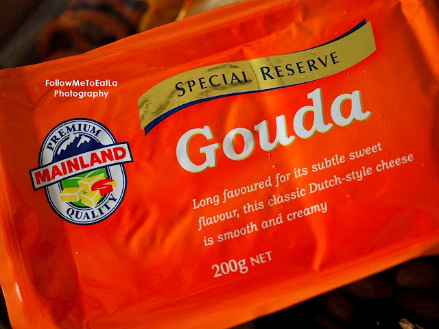 Gouda, which is a Dutch-style semi-soft cheese