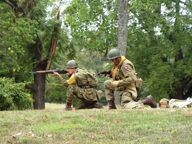 U.S. Army Paratroopers doing a reenactment of actions following their landing on D-Day