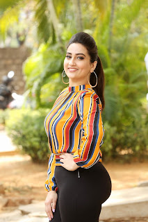 Telugu TV Anchor / Actress Manjusha in Colorful Stripes Top Black Tight Pants on Ooranthaanuk Teaser Launch - CelebsHotWorld No Watermarks HQ Pics