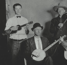 Iver Edwards on ukulele with G Stoneman, banjo, and E Dunford, fiddle.