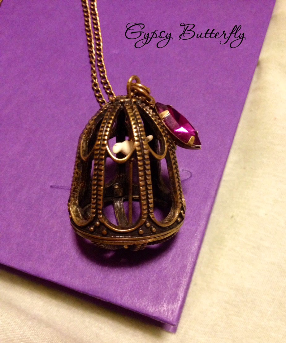https://www.etsy.com/listing/196900512/birdcage-necklace-with-bird-inside?