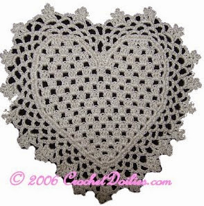 http://translate.google.es/translate?hl=es&sl=en&u=http://www.crochetdoilies.com/crochet_heart_coaster.html&prev=search