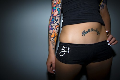 female rib tattoos. small hip tattoos for girls