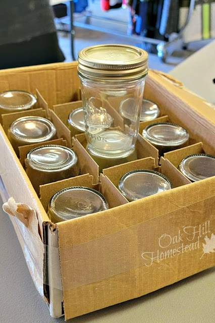 A box of used canning jars