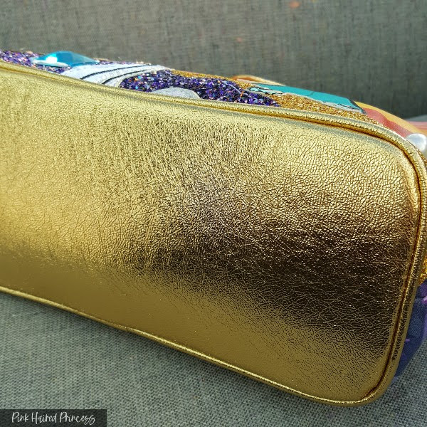 gold metallic base of handbag