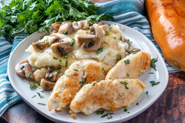 This easy meat and potatoes comfort food meal is perfect for a weeknight dinner, or even Sunday dinner! The mushrooms are delicious in the gravy with the chicken and you can serve with mashed potatoes, rice or pasta! Such a great homemade recipe!