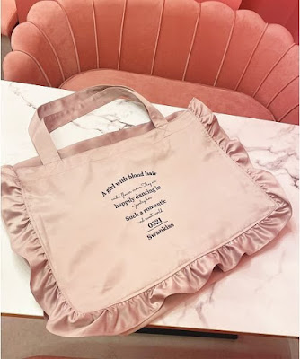 pink bag on a white table