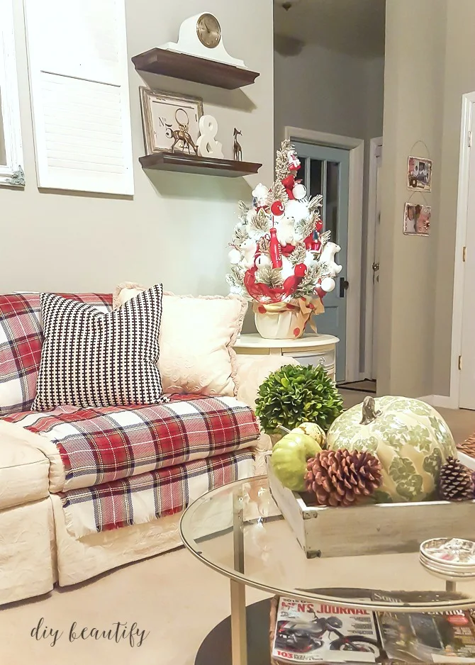 Adding plaid to your home decor is s great way to warm up your home during the winter months. Let me inspire you as I share several ways I'm decorating with plaid in my home. Read more at diy beautify! 