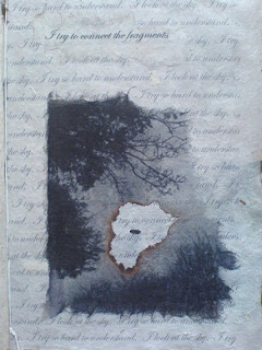 detail of page showing torn and burnt black and white image of trees, with text (I try to connect the fragments; I try so hard to understand, I look at the sky) and black stitch.