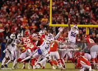 •	Kansas City Chiefs, Buffalo Bills, NFL, No. 1 seed, Playoff race, Patrick Mahomes, Josh Allen, High-octane offense, Suffocating defense, Must-win games, NFL playoffs, Playoff implications, Coach strategies, Playoff picture, Fan excitement.