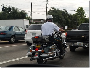 I had to take a pic of this Hiway Patrol man on his old fashioned Harley