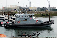 Her Majesty's Cutter Speedwell, also CPV Speedwell (Coastal Patrol Vessel). One of 8 BP ARRC's (British Petroleum 'Autonomous Rescue and Recovery Craft') purchased by UK Government 2016. Inner Tidal Harbour of the Marina. Dolphin Hard and Jetty, Lifeboat RNLB 17-09 City of London II.