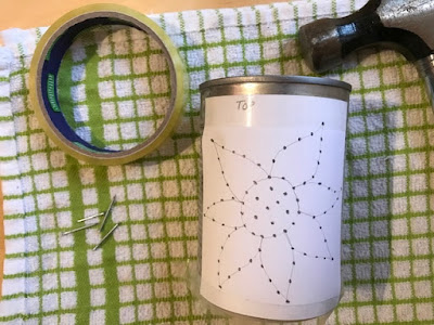 How to make tin can lanterns with nails