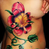 Flower Rib Tattoos : 54 Unique Rib Tattoos Designs And Ideas : Hibiscus flowers tattoos on rib side do not always large and extensive.