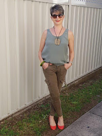 Green cargo pants-green sleeveless top-red shoes