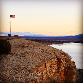 american flag and mountains