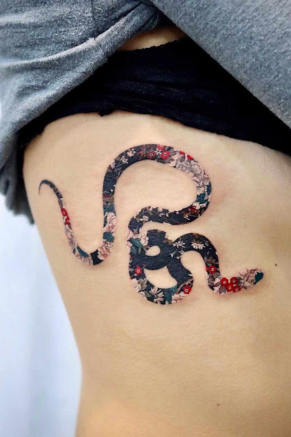 50 tatuagens de cobras que vão te fazer querer uma imediatamente