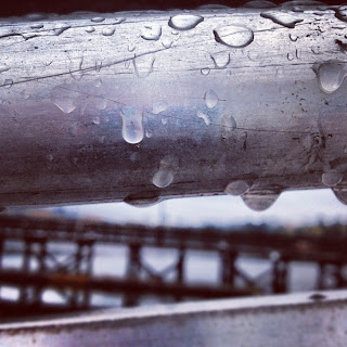 rain water drops on water pipe