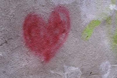 Graffiti image of a heart from the old town centre of Genoa, Italy.