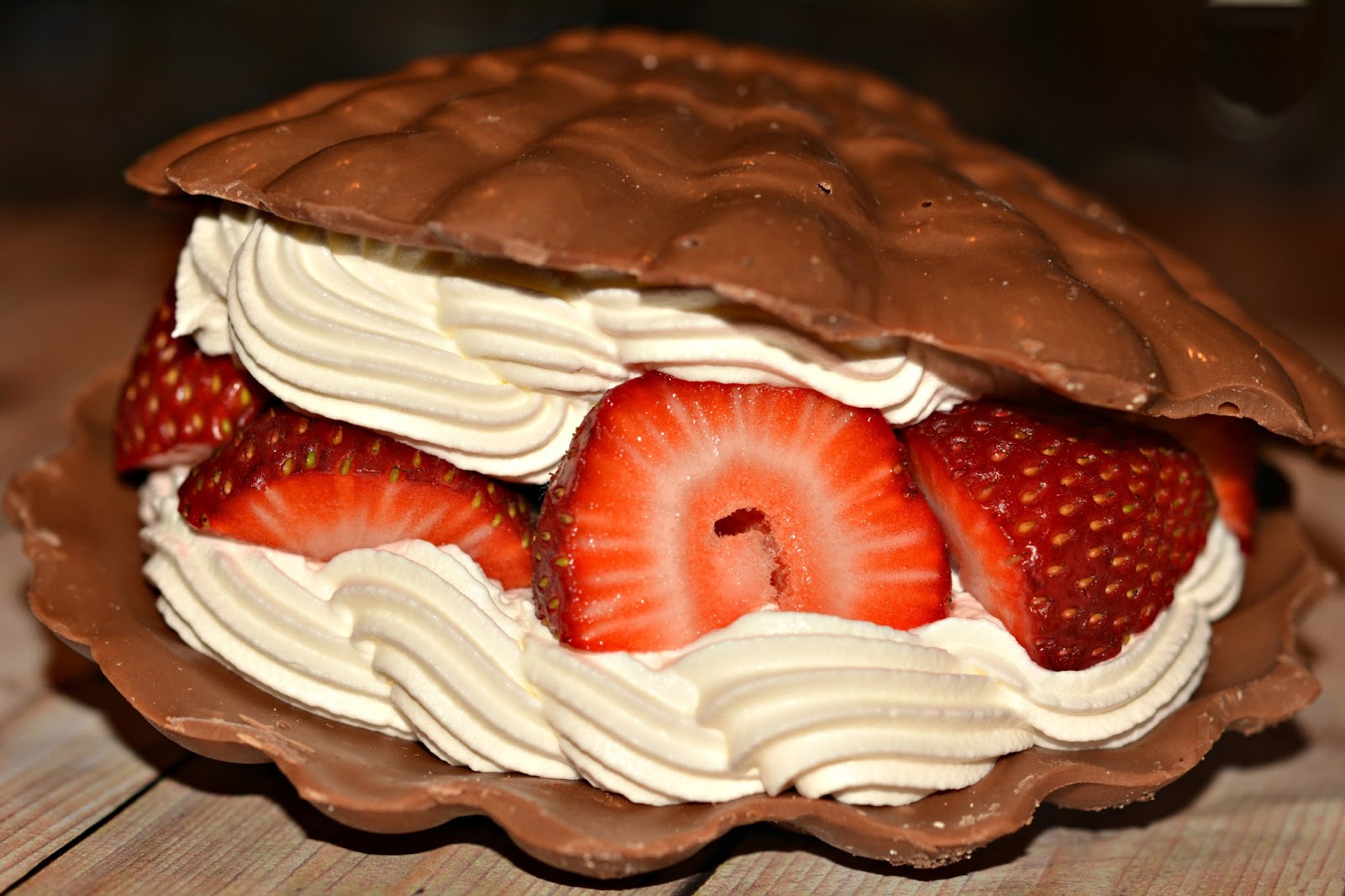 chocolate cake with strawberries and whipped cream  CHOCOLATE MOLD TO MAKE TWO SHELLS. FILL WITH PIPED WHIPPED CREAM AND