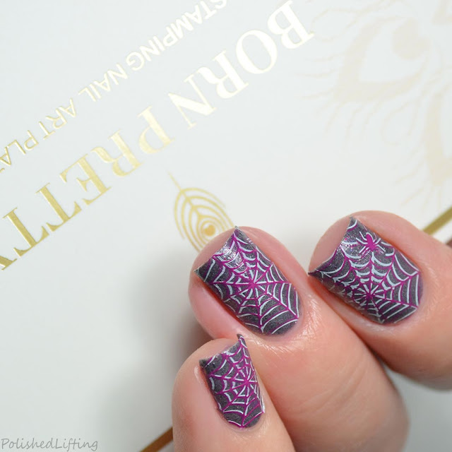 purple spiderweb nail art